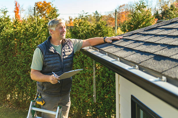 Professional Roofing technician working in Lesage, WV